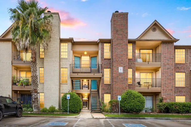 a front view of a multi story residential apartment building