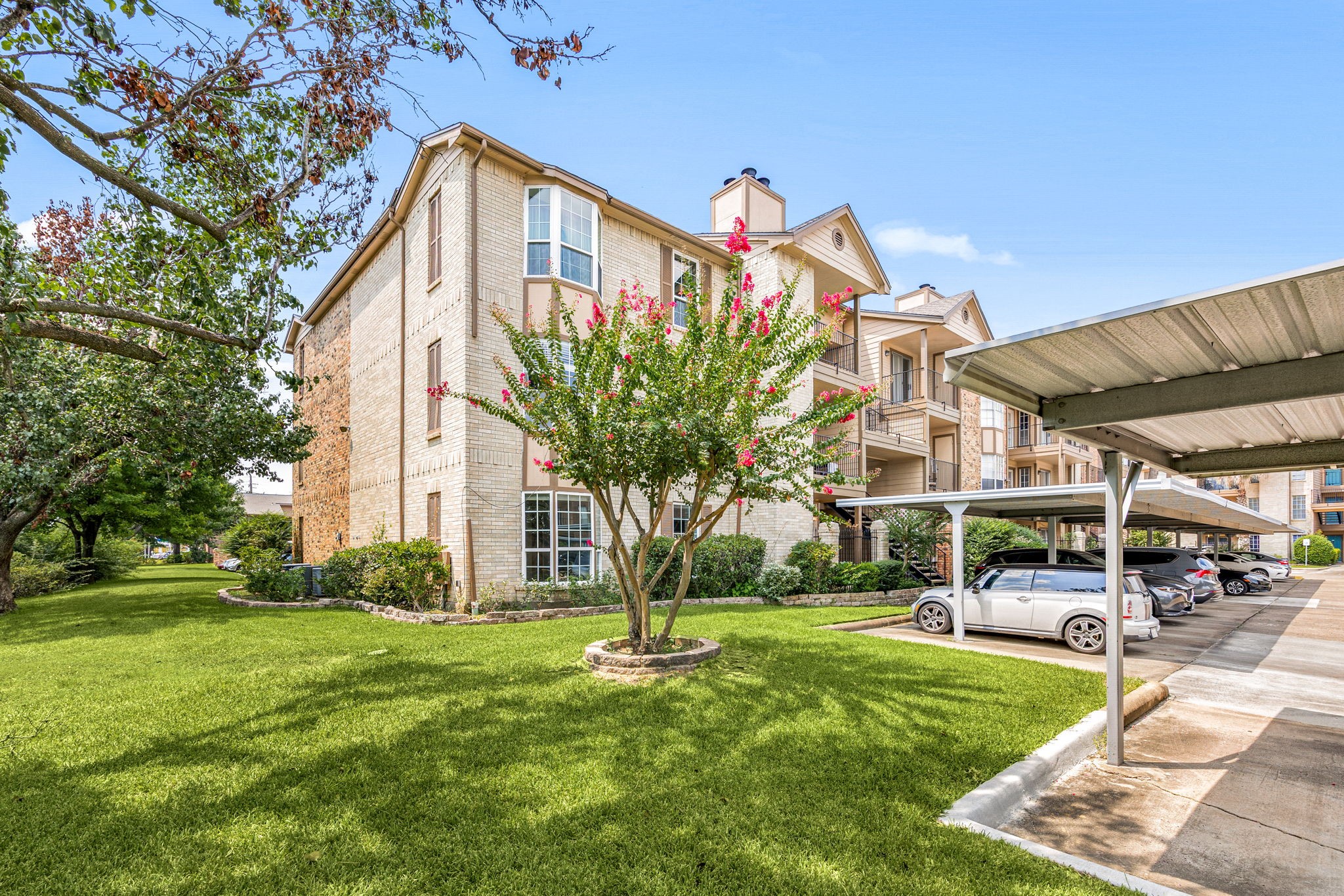 2121 Hepburn Street, Unit 710 Houston, TX 77054 - Photo 13 of 35 a front view of a building with a garden