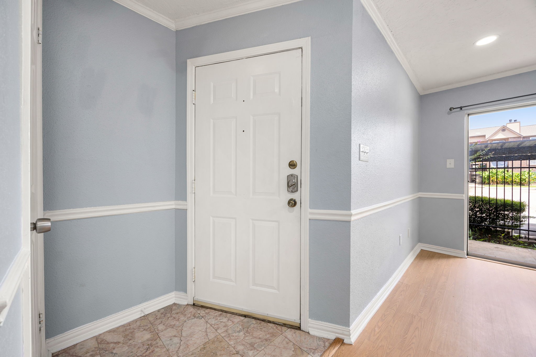 2121 Hepburn Street, Unit 710 Houston, TX 77054 - Photo 17 of 35 a view of hallway with wooden floor and a window