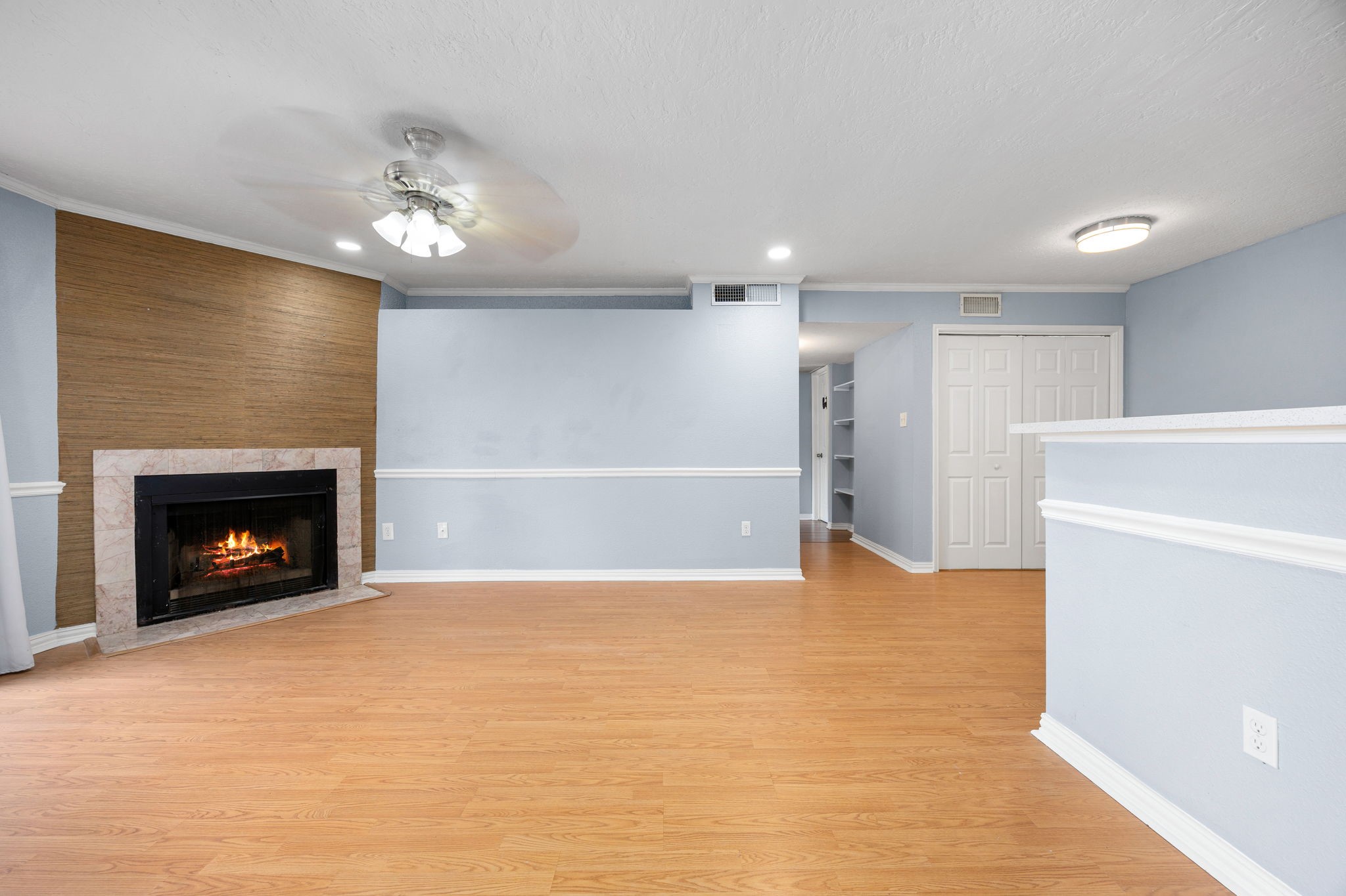 2121 Hepburn Street, Unit 710 Houston, TX 77054 - Photo 6 of 35 a view of an empty room with a fireplace