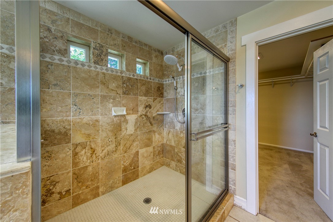 20821 Miller Bay Road Northeast Poulsbo, WA 98370 - Photo 24 of 40 a bathroom with a shower