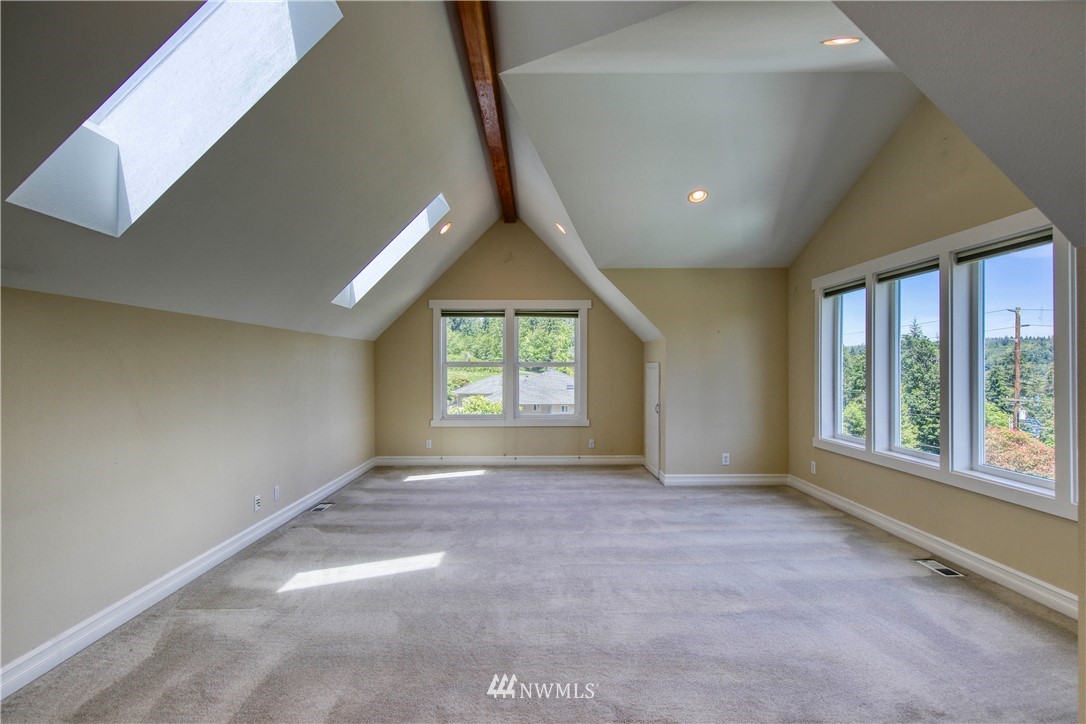 20821 Miller Bay Road Northeast Poulsbo, WA 98370 - Photo 28 of 40 a view of an empty room with a window