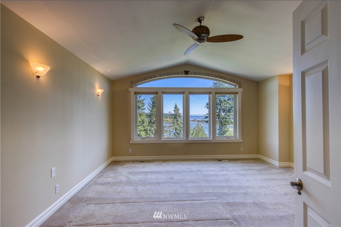 20821 Miller Bay Road Northeast Poulsbo, WA 98370 - Photo 33 of 40 a view of an empty room with a window