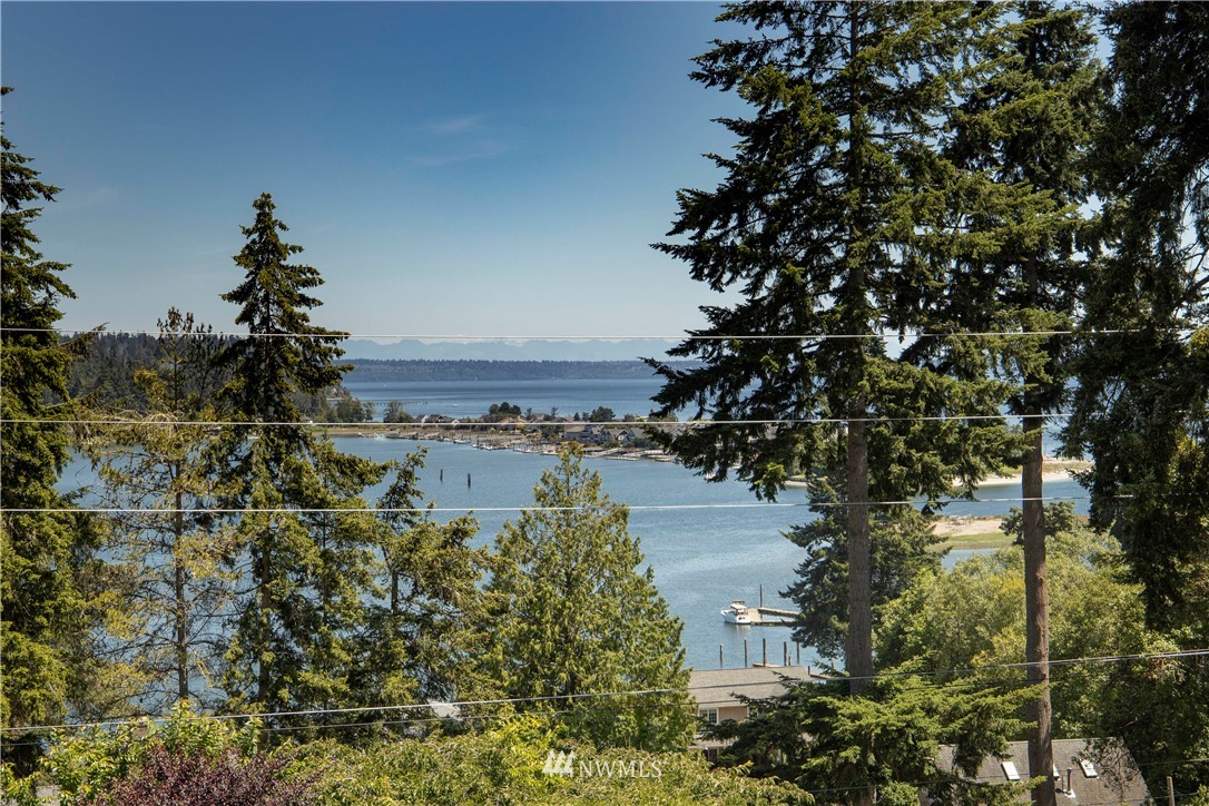 20821 Miller Bay Road Northeast Poulsbo, WA 98370 - Photo 35 of 40 a view of a lake