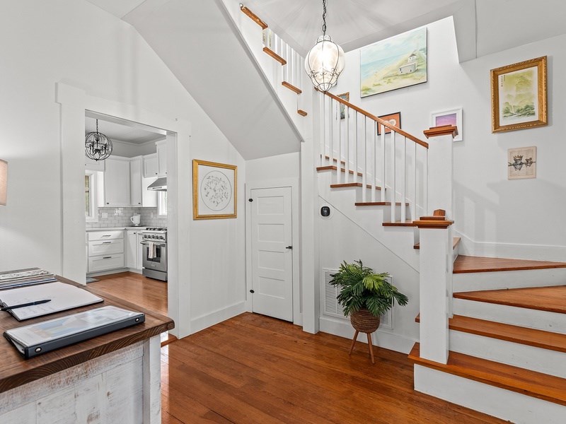 44 Segner Road Fredericksburg, TX 78624 - Photo 18 of 21 a view of a hallway with wooden floor and entryway