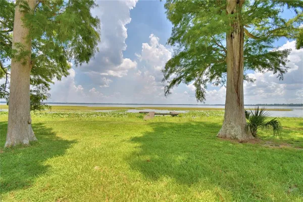 a view of an outdoor space and a yard
