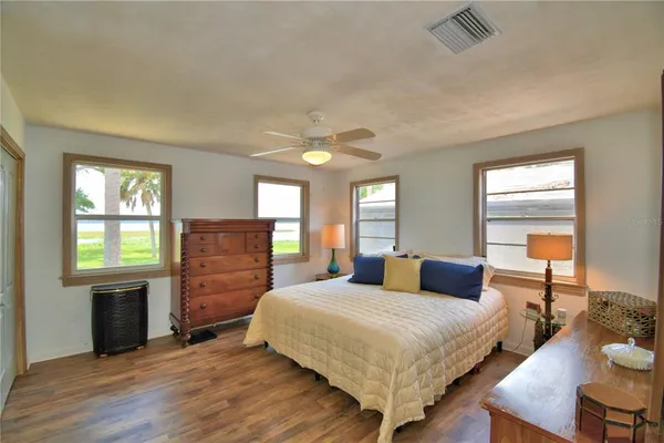a view of a livingroom with furniture and windows