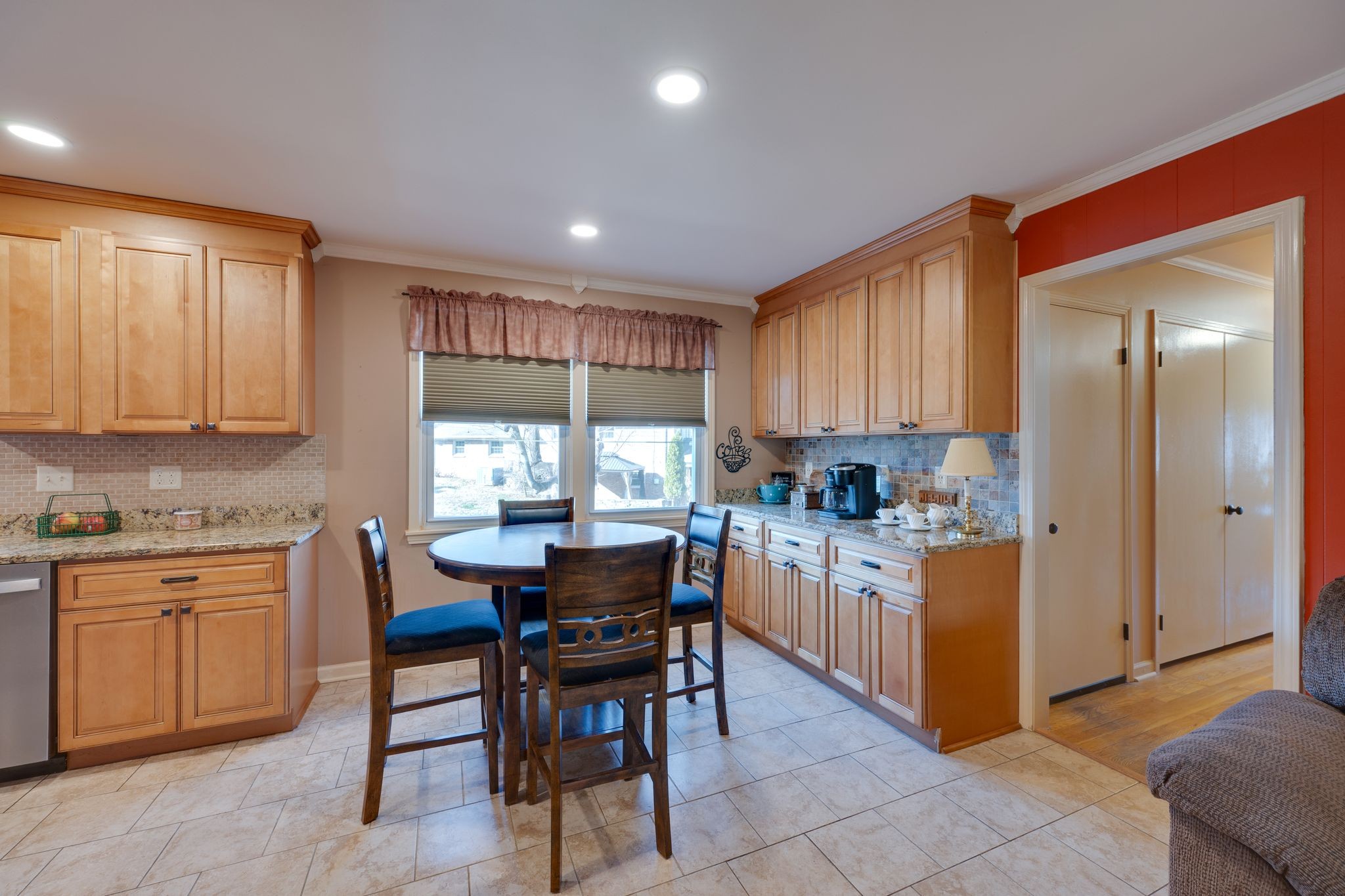 901 Azalea Drive Columbia, TN 38401 - Photo 12 of 28 a kitchen with a dining table chairs and refrigerator