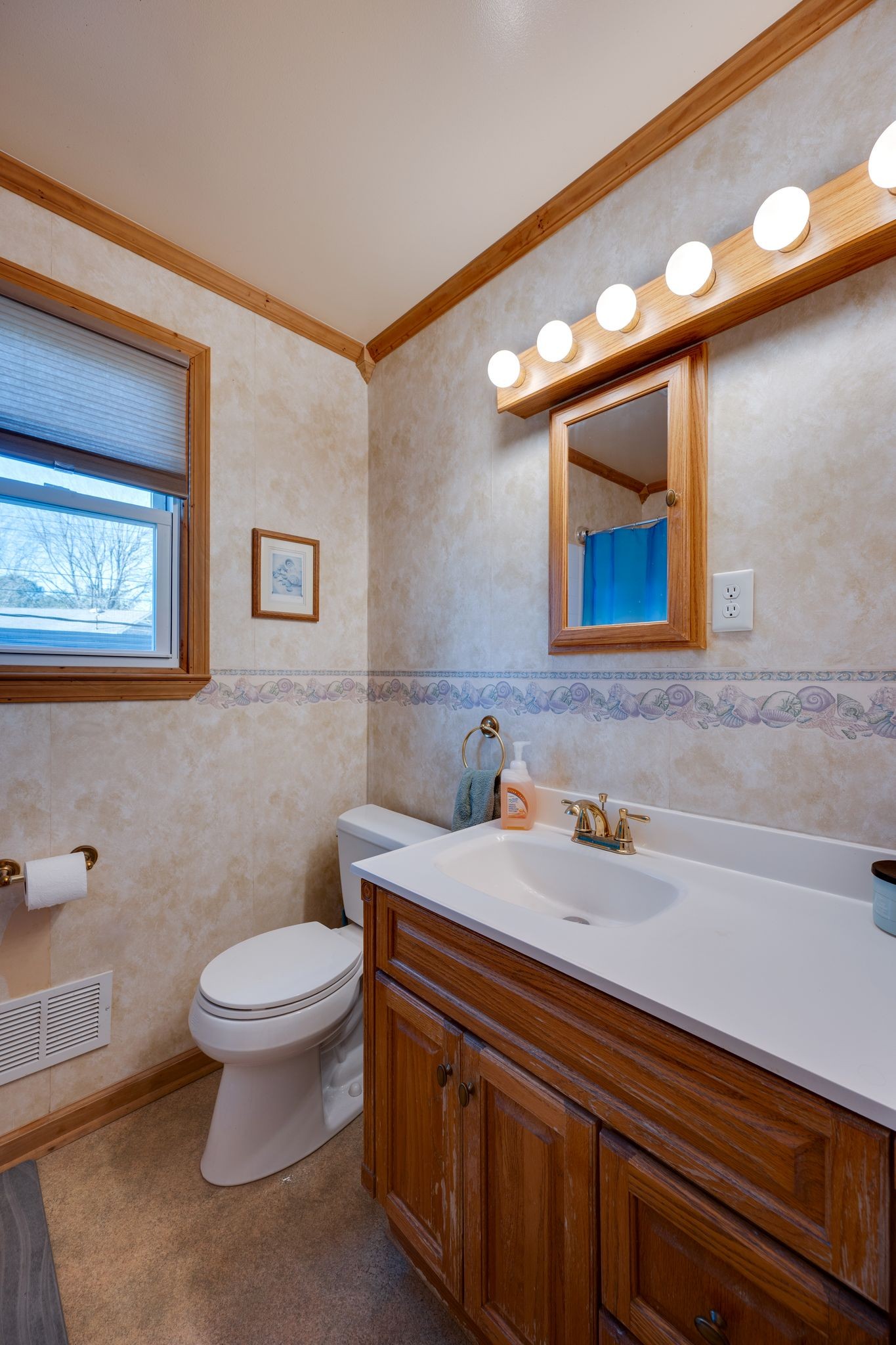 901 Azalea Drive Columbia, TN 38401 - Photo 19 of 28 a bathroom with a sink and a toilet