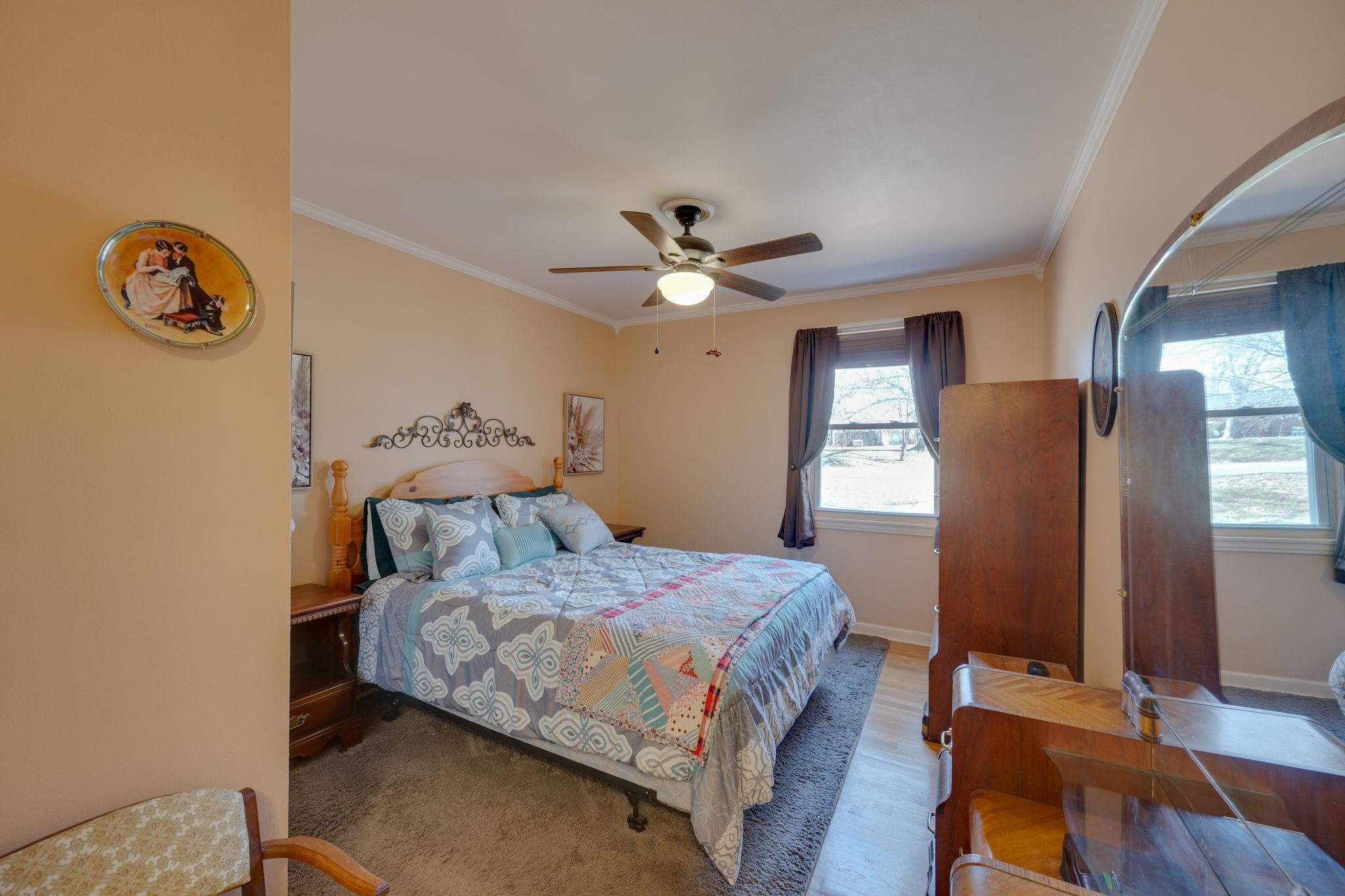 901 Azalea Drive Columbia, TN 38401 - Photo 20 of 28 a bedroom with a bed and a chandelier