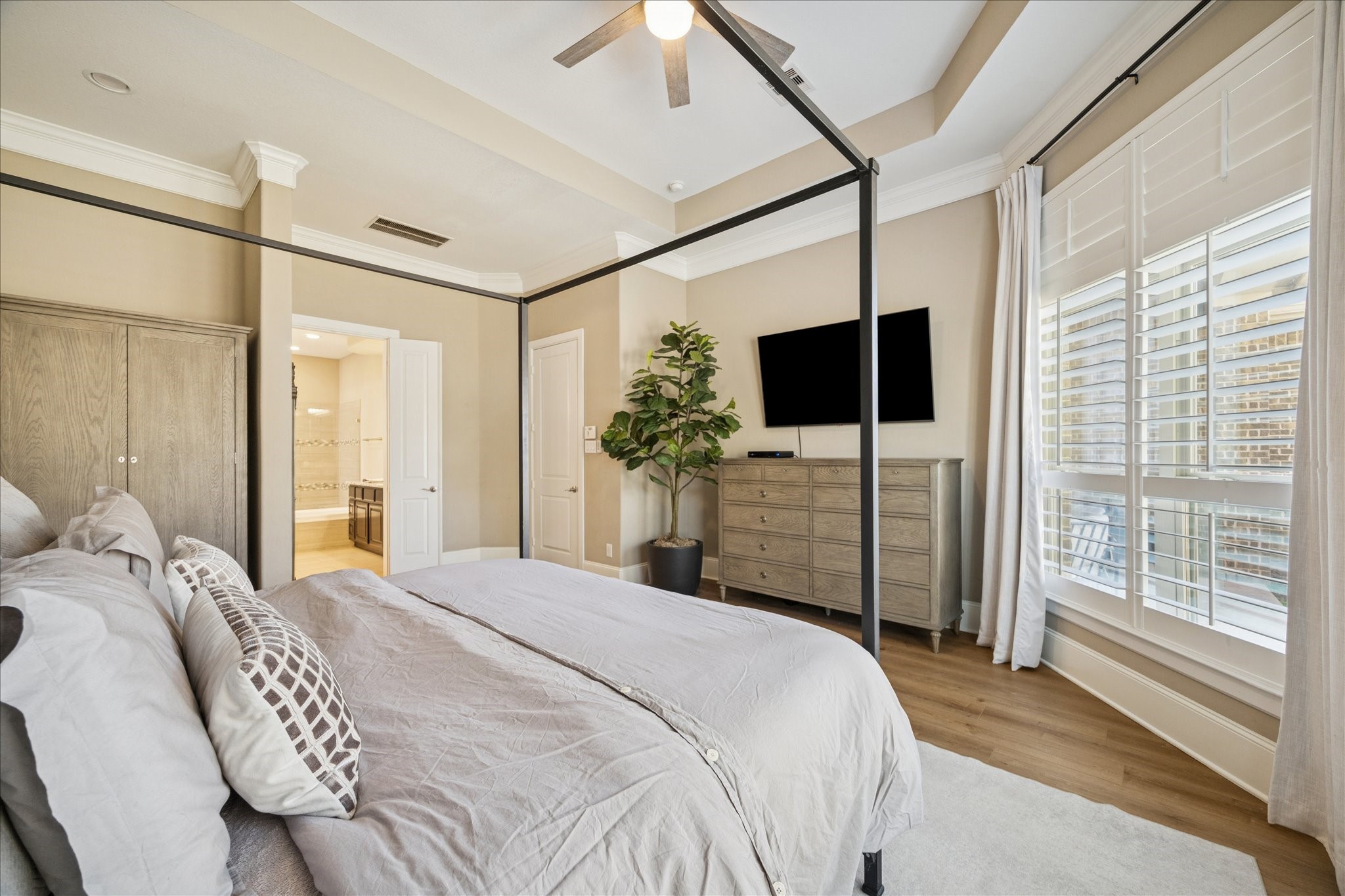 2914 Rutherford Pl Court Katy, TX 77494 - Photo 14 of 36 Additional view of the primary suite highlighting generous space, natural light, and access to the spa-style bathroom.