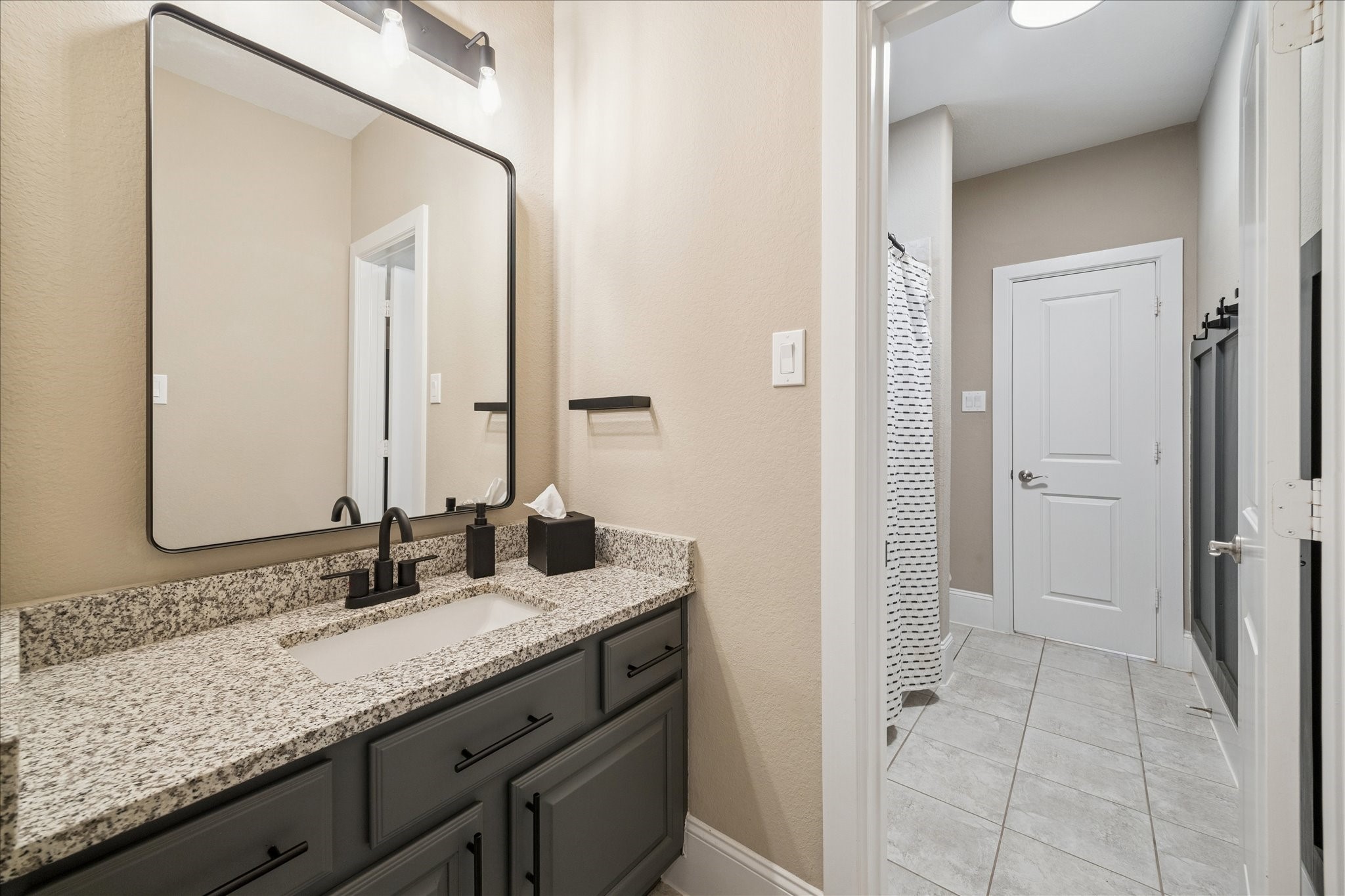 2914 Rutherford Pl Court Katy, TX 77494 - Photo 26 of 36 Full bathroom featuring tile surround, modern vanity, and neutral finishes for a clean, timeless look.