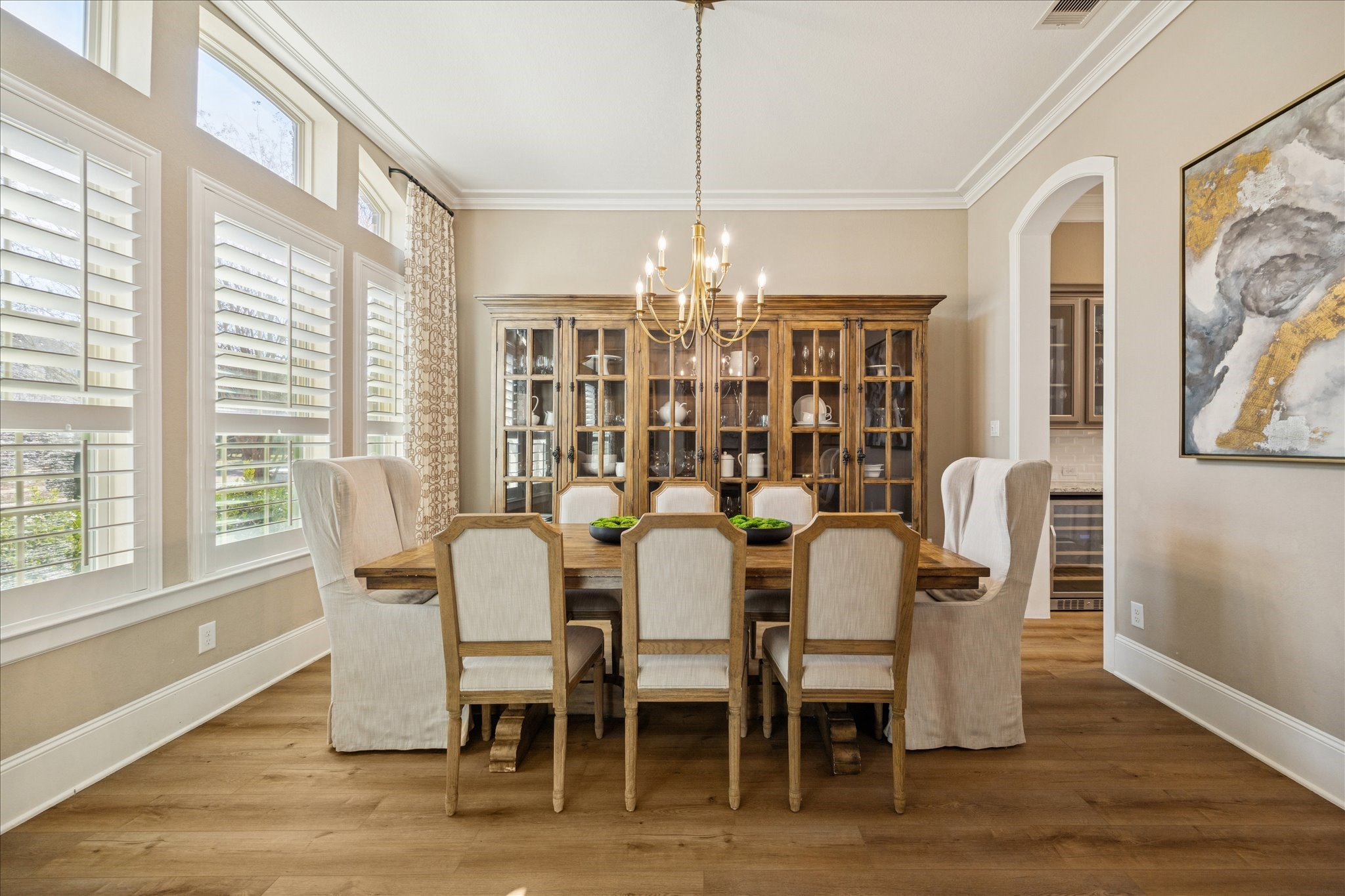 2914 Rutherford Pl Court Katy, TX 77494 - Photo 8 of 36 Elegant dining room with designer lighting, plantation shutters, and space to comfortably host gatherings.