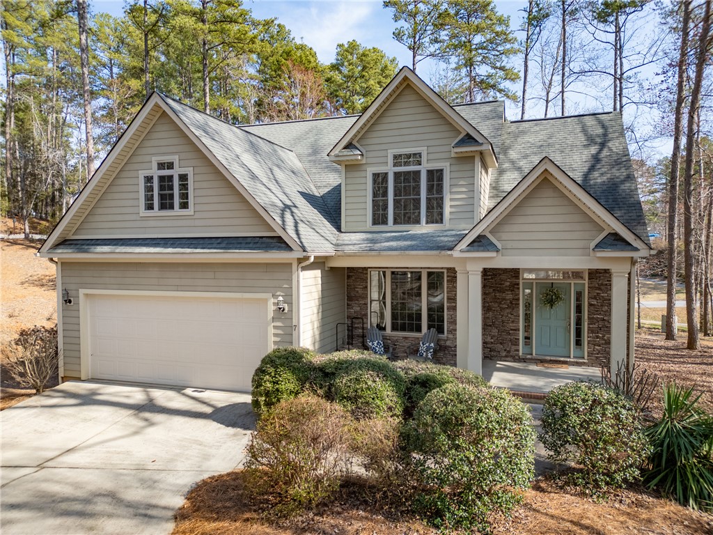 7 Divots Landing Salem, SC 29676 - Photo 1 of 47 This charming home features a two-car garage and inviting front porch with natural stone accents.