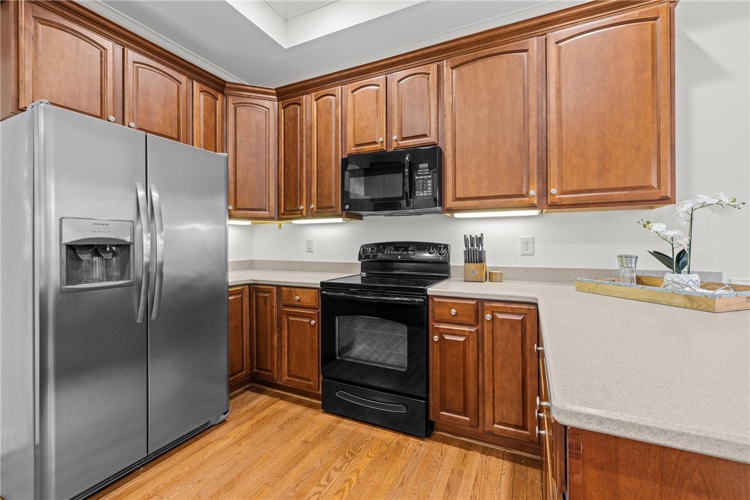 7 Divots Landing Salem, SC 29676 - Photo 16 of 47 This functional kitchen features rich wood cabinetry and essential appliances for daily living.