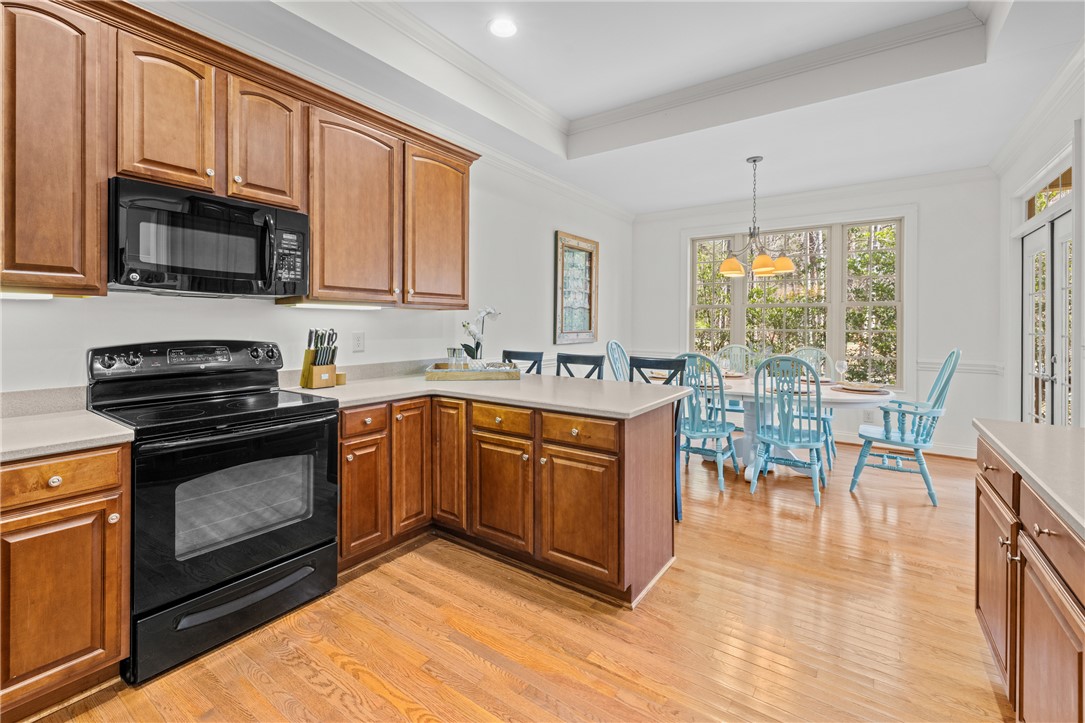7 Divots Landing Salem, SC 29676 - Photo 17 of 47 This spacious kitchen and dining area features abundant natural light and ample cabinetry.