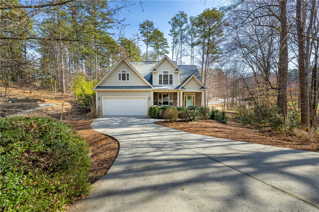 7 Divots Landing Salem, SC 29676 - Photo 2 of 47 This inviting residence features a well-manicured yard and a classic architectural design.