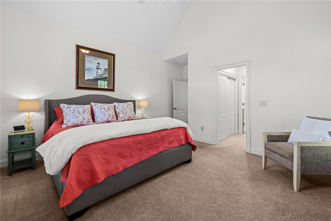 7 Divots Landing Salem, SC 29676 - Photo 20 of 47 This cozy bedroom features a vaulted ceiling and soft carpeting, creating a tranquil retreat.