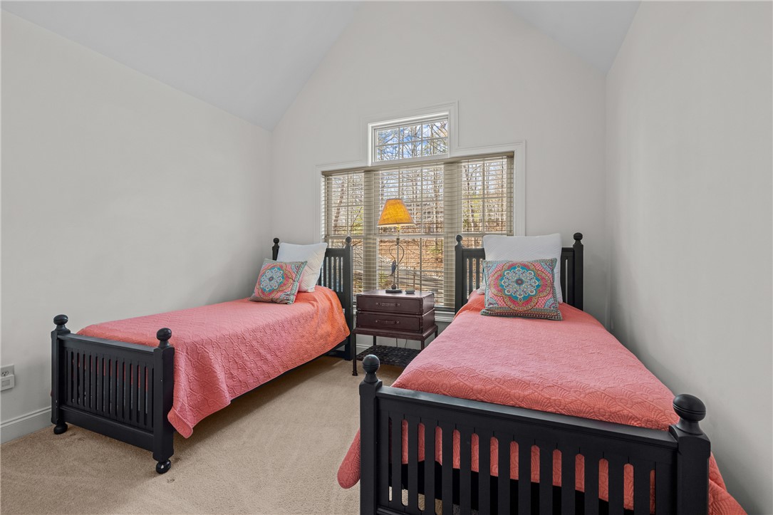 7 Divots Landing Salem, SC 29676 - Photo 31 of 47 This bright bedroom features a vaulted ceiling and a large window with privacy blinds.