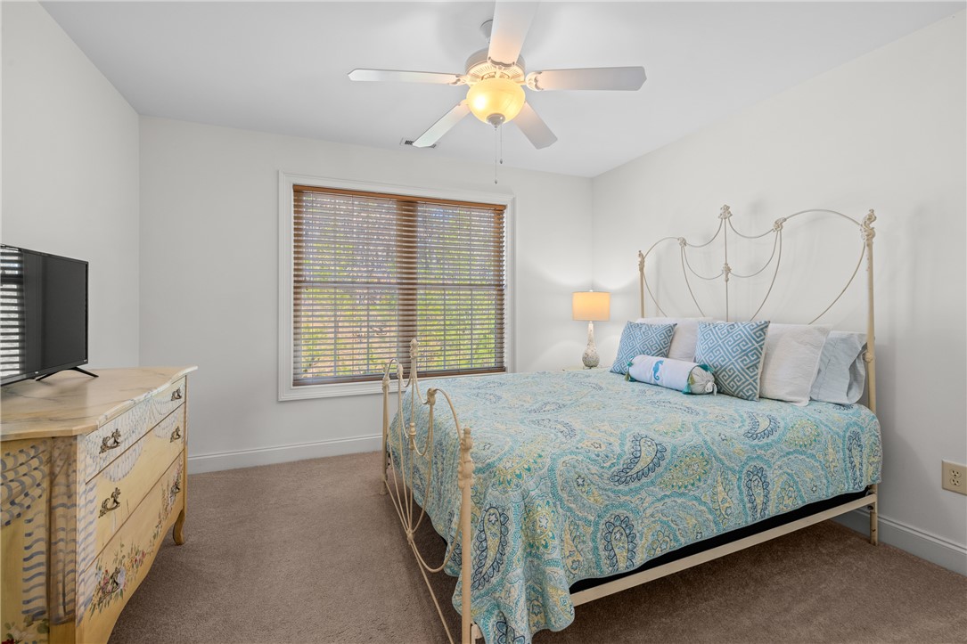 7 Divots Landing Salem, SC 29676 - Photo 32 of 47 This restful bedroom offers a cozy retreat with ample natural light.