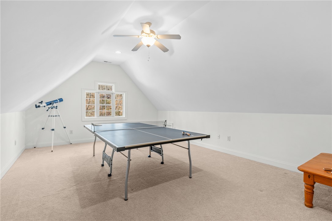 7 Divots Landing Salem, SC 29676 - Photo 34 of 47 This spacious attic conversion offers a versatile area for recreation or relaxation.