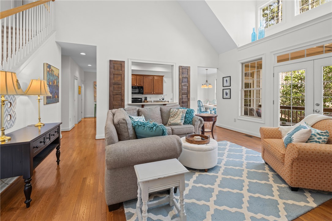 7 Divots Landing Salem, SC 29676 - Photo 10 of 47 This airy living space offers soaring ceilings, bright windows, and seamless flow to the kitchen and dining area.