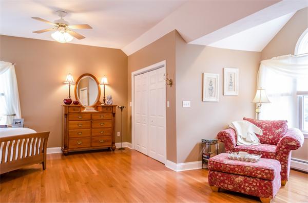 38 Earls Court Rochester, MA 02770 - Photo 12 of 26 a living room with furniture and a dresser