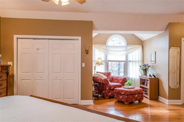 38 Earls Court Rochester, MA 02770 - Photo 13 of 26 a living room with furniture chandelier and a window