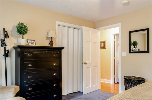 38 Earls Court Rochester, MA 02770 - Photo 18 of 26 a bedroom with a bed and a dresser