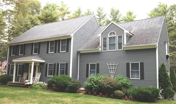 38 Earls Court Rochester, MA 02770 - Photo 2 of 26 a front view of a house with a yard