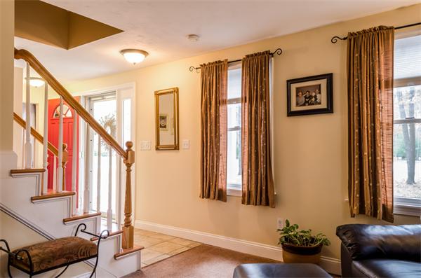 38 Earls Court Rochester, MA 02770 - Photo 21 of 26 a view of hallway with furniture and a window