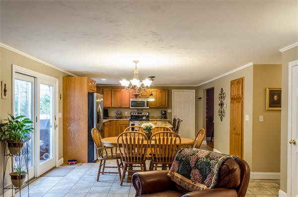 38 Earls Court Rochester, MA 02770 - Photo 7 of 26 a bedroom with furniture and a potted plant