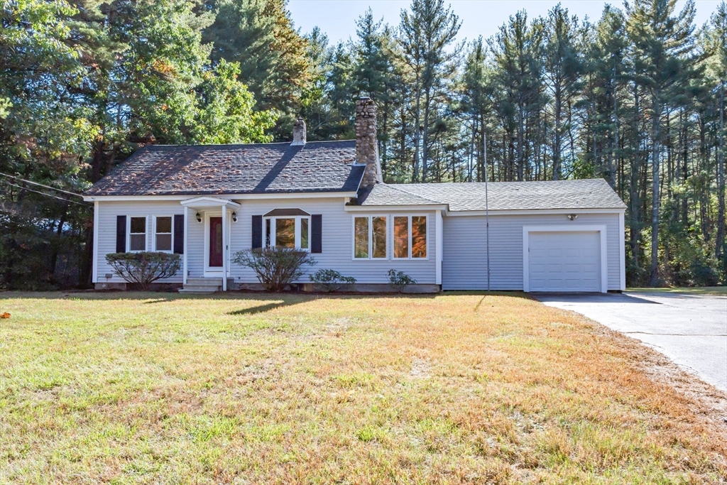 137 Lowell Road Pepperell, MA 01463 - Photo 1 of 40 a front view of a house with a yard