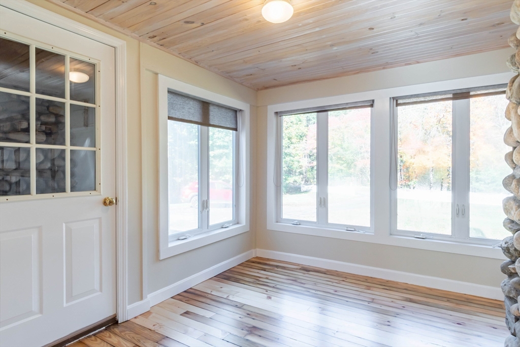 137 Lowell Road Pepperell, MA 01463 - Photo 16 of 40 a view of an empty room with a window