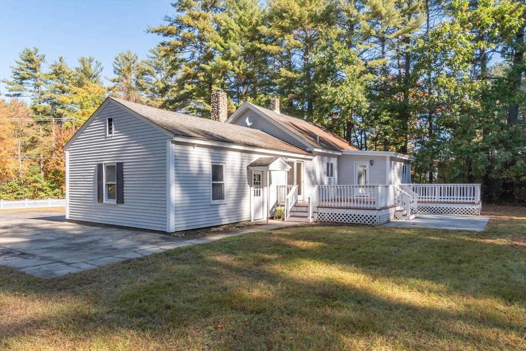 137 Lowell Road Pepperell, MA 01463 - Photo 33 of 40 a view of a house with a yard