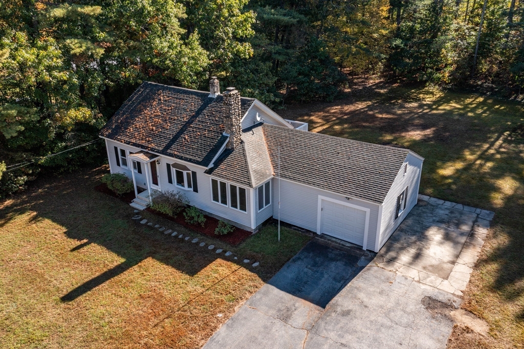 137 Lowell Road Pepperell, MA 01463 - Photo 34 of 40 a view of a house with a yard balcony and sitting area
