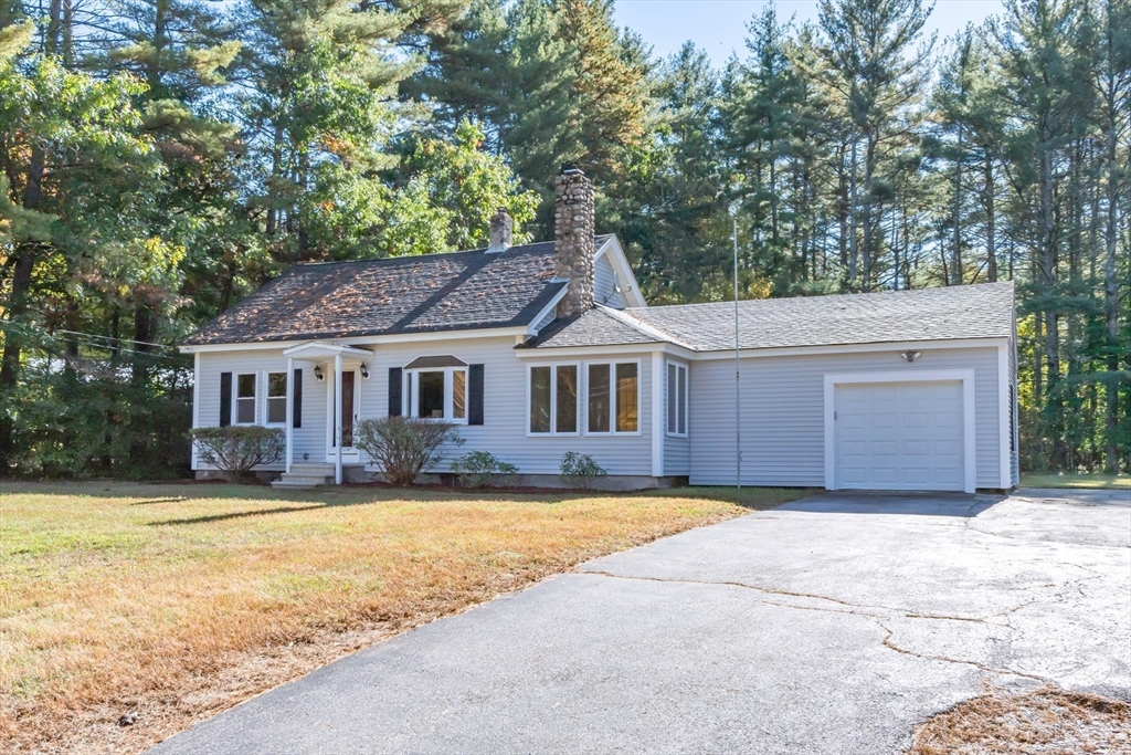 137 Lowell Road Pepperell, MA 01463 - Photo 35 of 40 a front view of a house with a yard