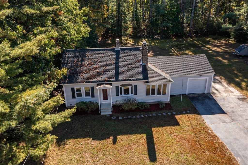 137 Lowell Road Pepperell, MA 01463 - Photo 36 of 40 a aerial view of a house with a yard