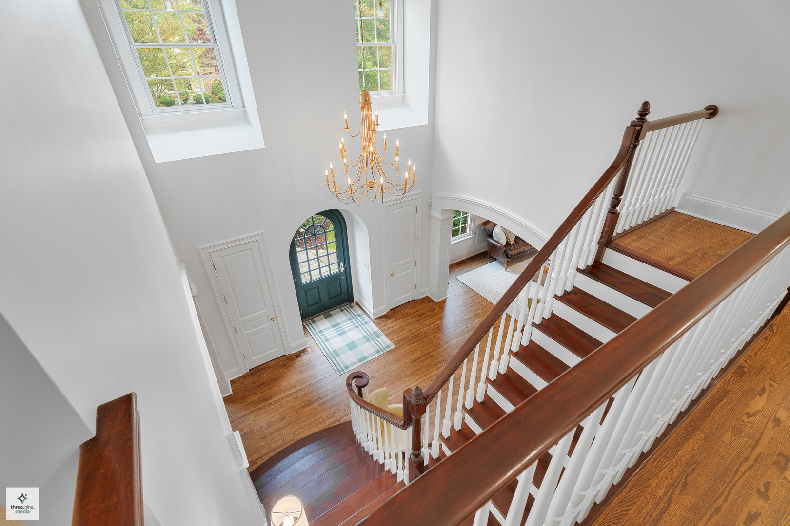 8010 Greenbriar Court Burr Ridge, IL 60527 - Photo 11 of 52 a view of entryway livingroom and hallway with wooden floor