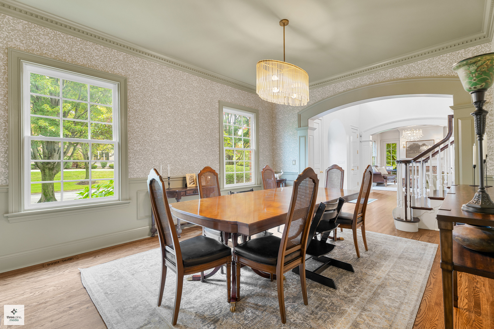 8010 Greenbriar Court Burr Ridge, IL 60527 - Photo 13 of 52 a view of a dining room with furniture window and wooden floor