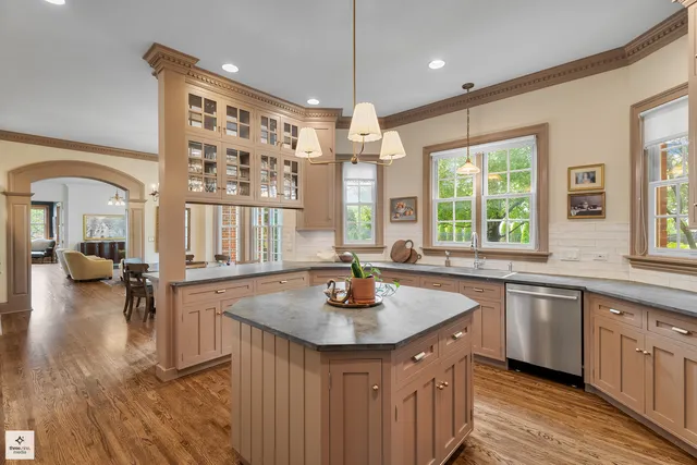 a kitchen with granite countertop lots of different kinds of food