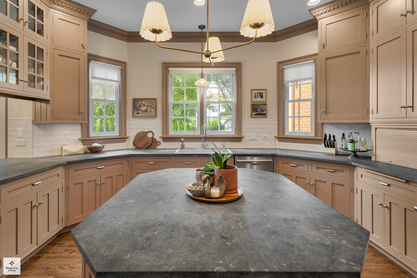 8010 Greenbriar Court Burr Ridge, IL 60527 - Photo 19 of 52 a kitchen with a sink window and cabinets