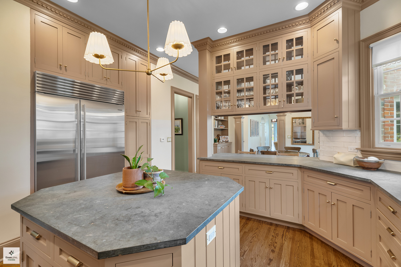 8010 Greenbriar Court Burr Ridge, IL 60527 - Photo 21 of 52 a kitchen with stainless steel appliances granite countertop a sink and a refrigerator