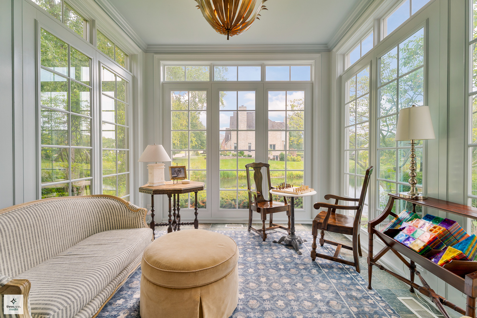 8010 Greenbriar Court Burr Ridge, IL 60527 - Photo 26 of 52 a living room with furniture and a large window