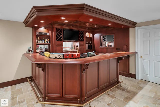 a bedroom with a bed and a cabinets