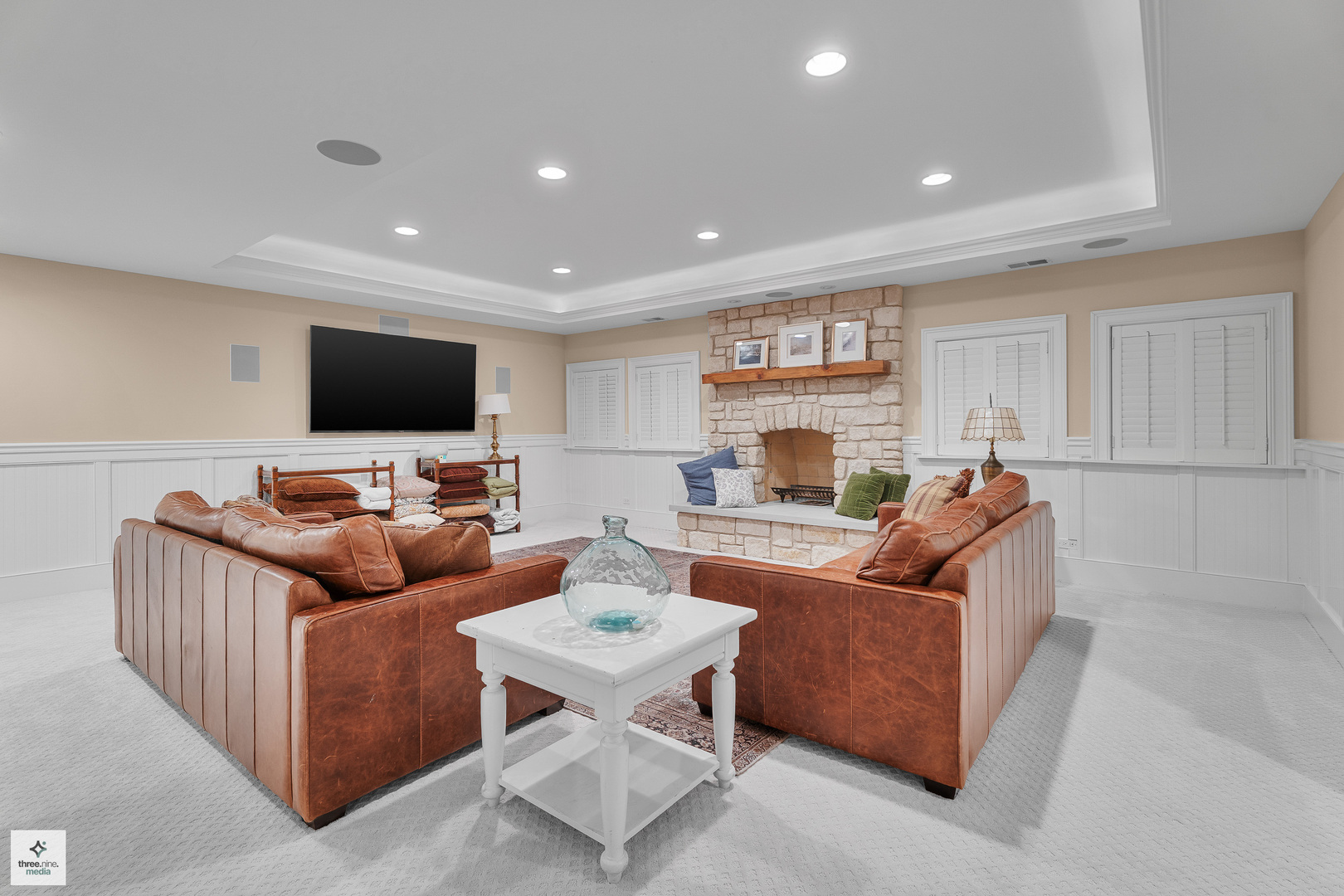 8010 Greenbriar Court Burr Ridge, IL 60527 - Photo 50 of 52 a living room with furniture and a flat screen tv