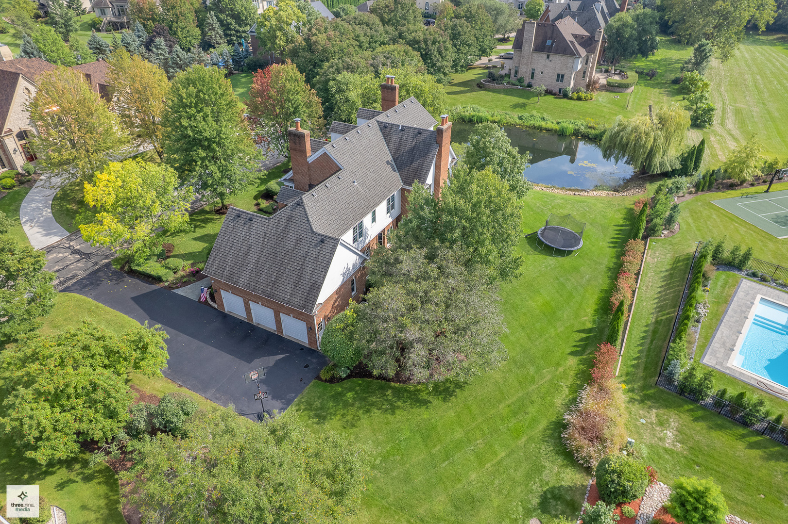 8010 Greenbriar Court Burr Ridge, IL 60527 - Photo 5 of 52 an aerial view of a house with a yard basket ball court and outdoor seating