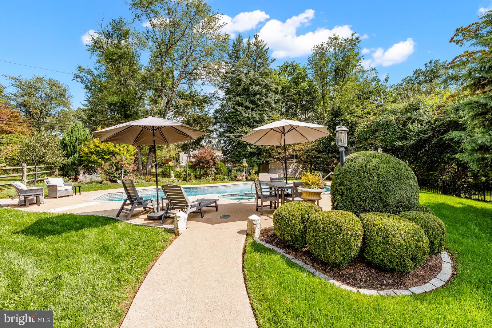517 Georgian Road Glenside, PA 19038 - Photo 59 of 80 Serene backyard oasis with poolside charm.