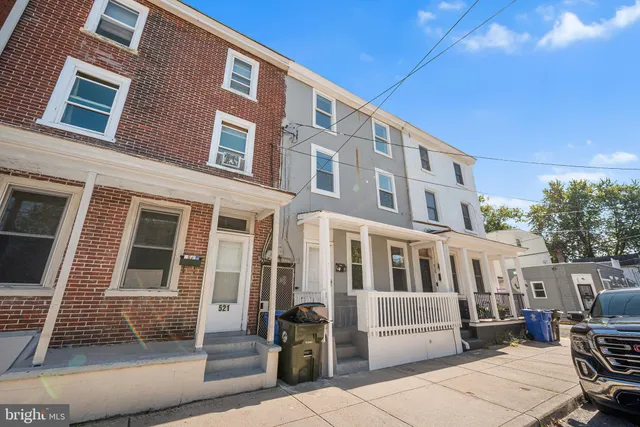 a front view of a building with glass windows