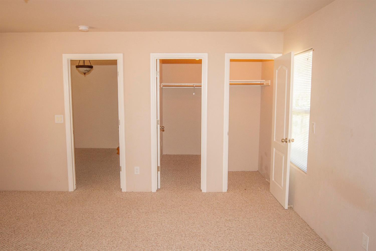 35080 George Smith Road Squaw Valley, CA 93675 - Photo 18 of 54 Master bedroom and his and hers walk-in closets.